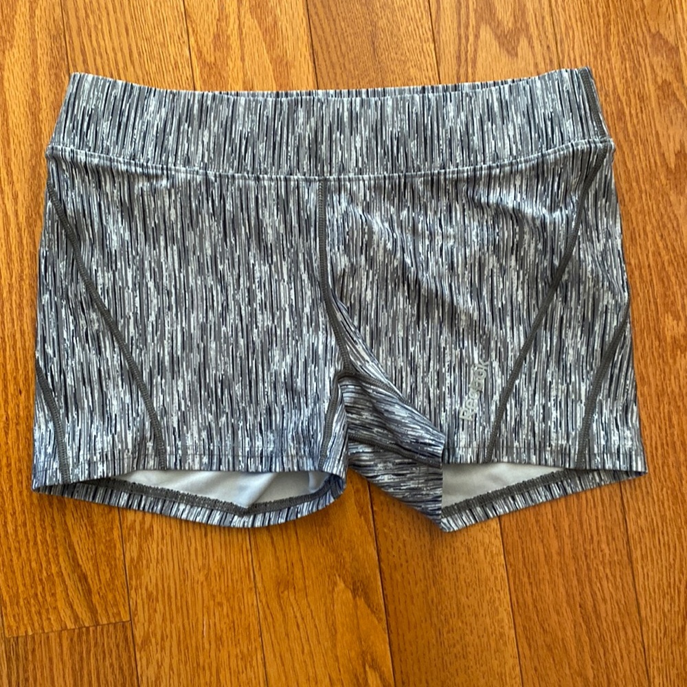Reebok. Women’s biker shorts. Size medium, grey